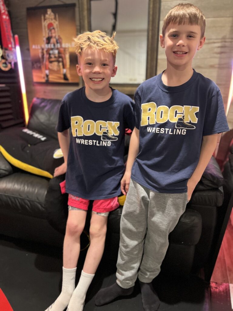 Jordan and Declan in the basement wrestling room