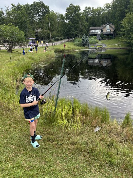 Jordan fishing at a pond