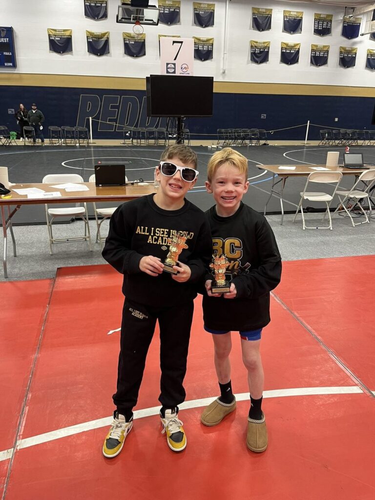 Jordan and JJ with their trophies