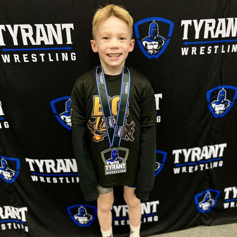 Jordan smiling with his medal at the Tyrant Duals